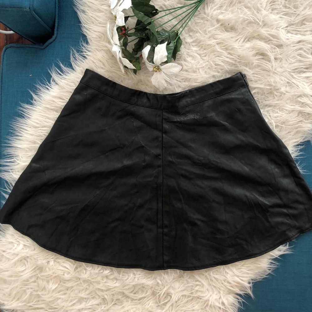 Black leather mini skirt